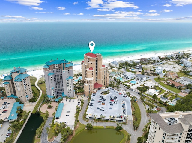 aerial view with a view of the beach and a water view