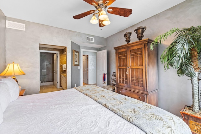 bedroom with ceiling fan and ensuite bath