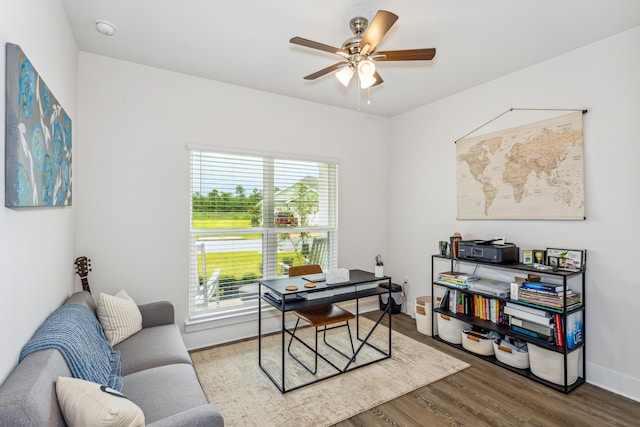 office featuring wood-type flooring and ceiling fan