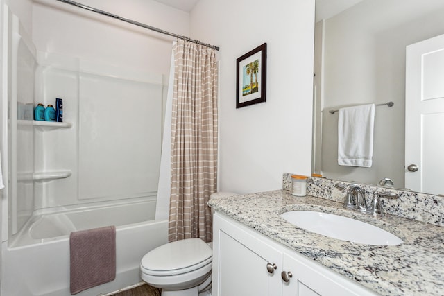 full bathroom featuring vanity, toilet, and shower / bath combo