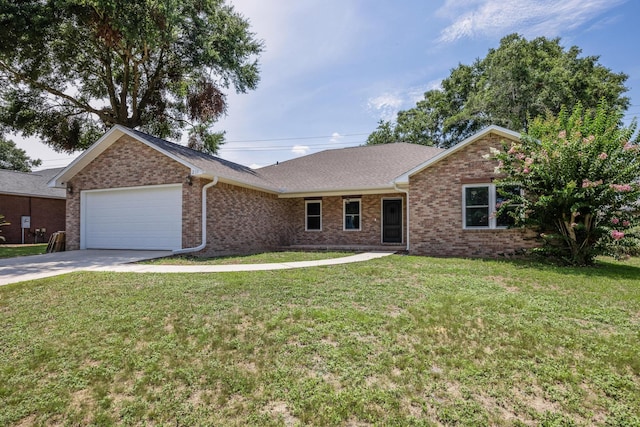 ranch-style home with a front yard and a garage