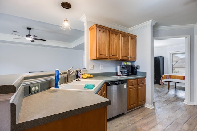 kitchen with sink, dishwasher, ceiling fan, light wood-type flooring, and ornamental molding