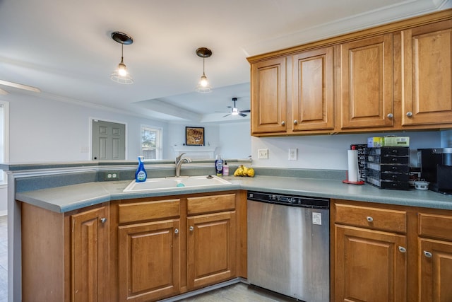 kitchen with hanging light fixtures, kitchen peninsula, a tray ceiling, sink, and stainless steel dishwasher