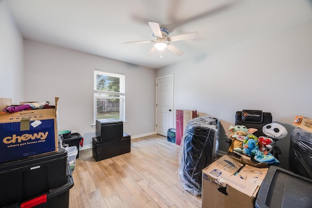 miscellaneous room featuring light wood-type flooring and ceiling fan