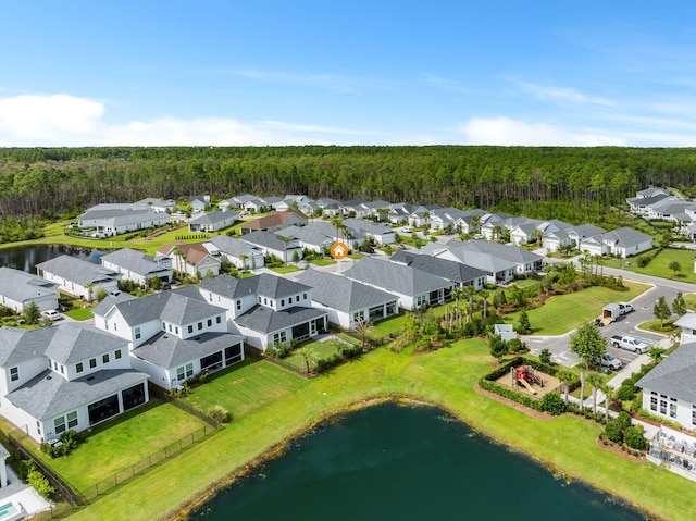 bird's eye view featuring a water view and a residential view