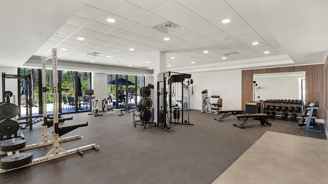 workout area with a drop ceiling