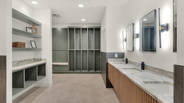 bathroom featuring vanity and tile patterned flooring