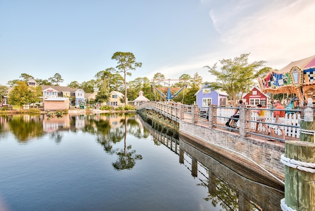 exterior space with a water view and a residential view