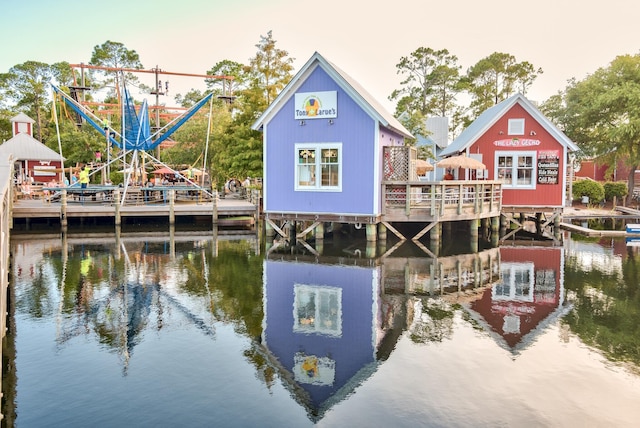 back of property with a water view