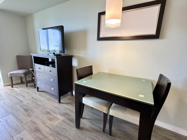 dining room featuring light hardwood / wood-style floors