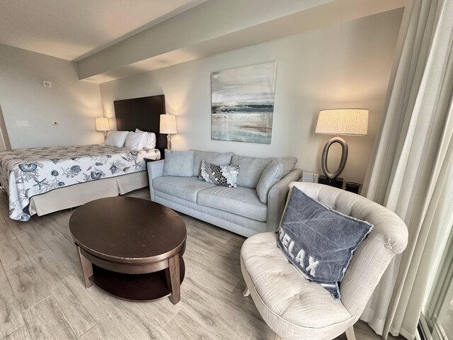 bedroom with light wood-style floors