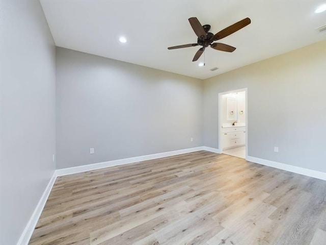 unfurnished room featuring a ceiling fan, recessed lighting, light wood-style flooring, and baseboards