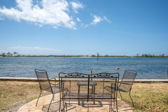 view of patio / terrace featuring a water view