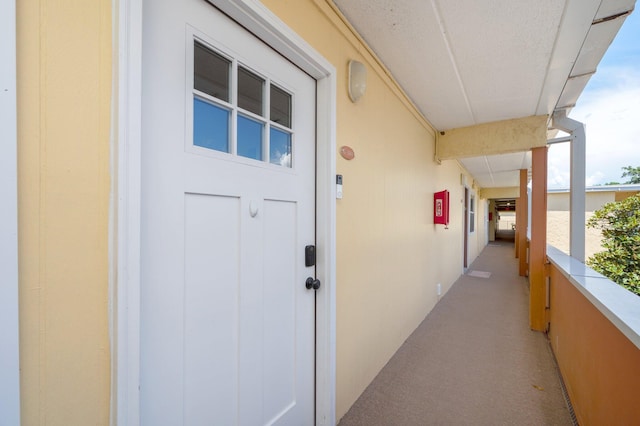 doorway to property with a balcony