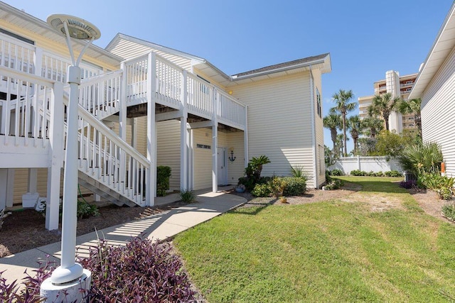 exterior space with a yard and a deck