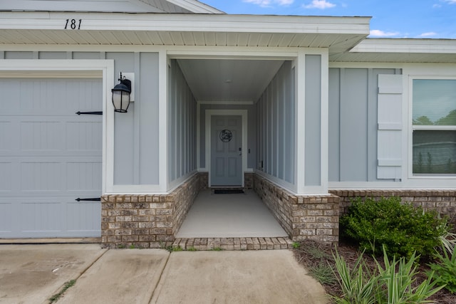 property entrance featuring a garage