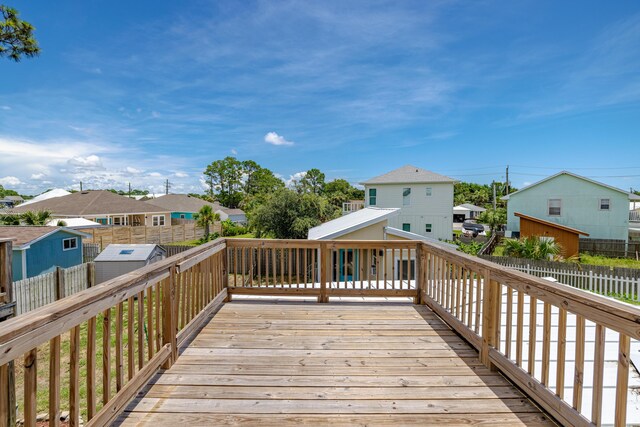 deck with an outdoor structure