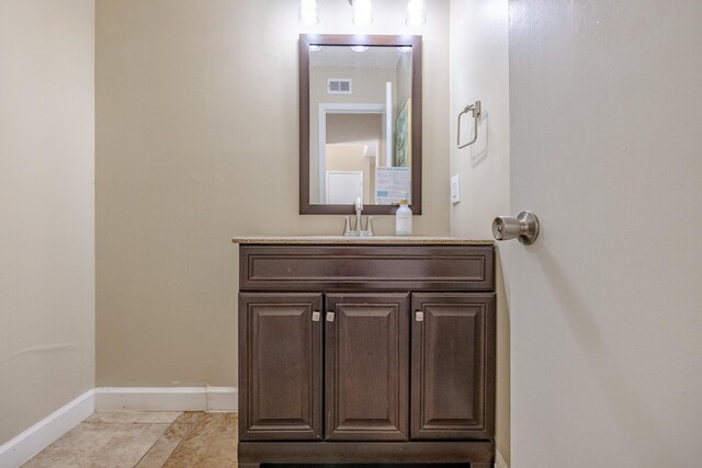 bathroom featuring vanity and tile patterned floors