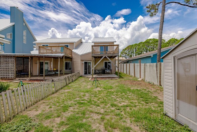 view of yard featuring a patio and a storage unit