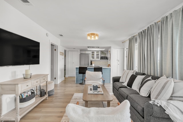 living room featuring light hardwood / wood-style floors