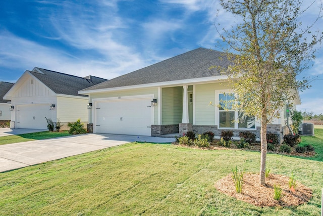 view of front facade with a garage and a front yard