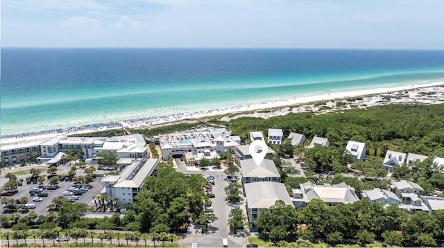 bird's eye view featuring a view of the beach and a water view