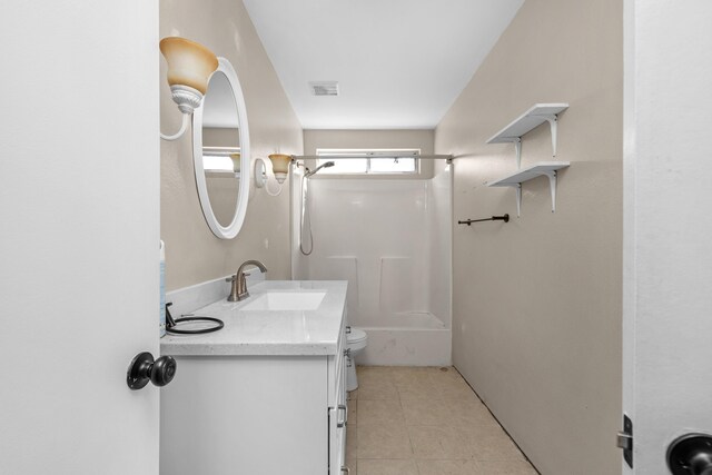 full bathroom featuring vanity, toilet, shower / tub combination, and tile patterned floors