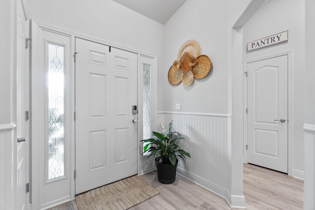 entrance foyer featuring light wood-type flooring