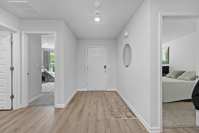 foyer entrance featuring light wood-type flooring