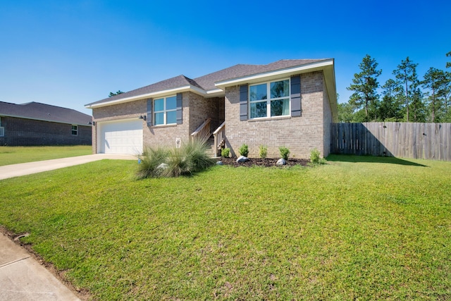 view of front of home with a garage and a front lawn