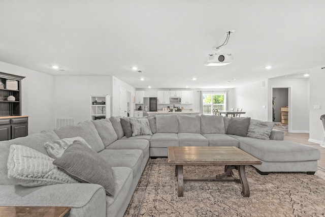 6537 Torrey Pnes, Laurel Hill, FL 32567 - living area featuring visible vents, light wood-style flooring, and recessed lighting