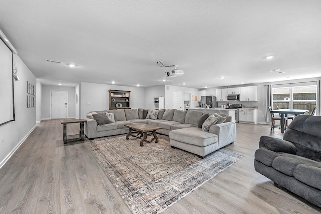 living room with light wood-type flooring