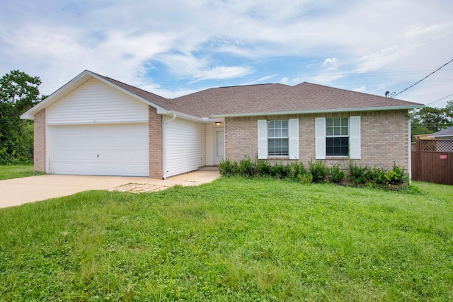 ranch-style house with a garage and a front yard