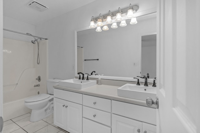 full bathroom with shower / washtub combination, dual vanity, toilet, and tile patterned floors