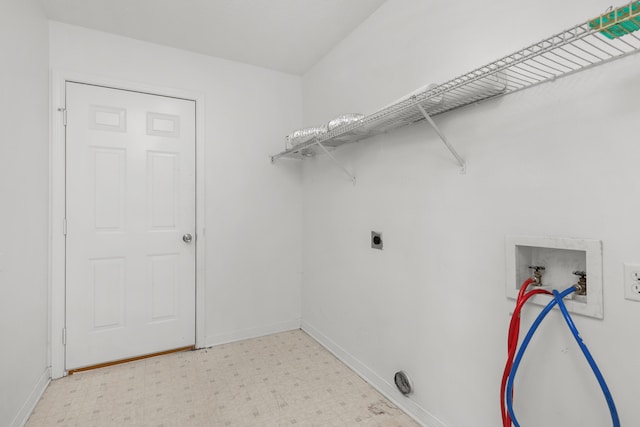 laundry area featuring light tile patterned flooring, hookup for an electric dryer, and washer hookup