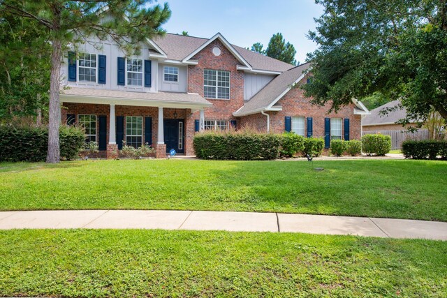 view of front of home with a front lawn