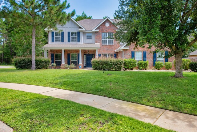 view of front of home featuring a front yard