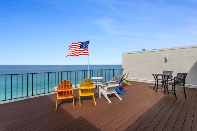 wooden terrace with a water view