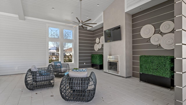 view of patio featuring ceiling fan