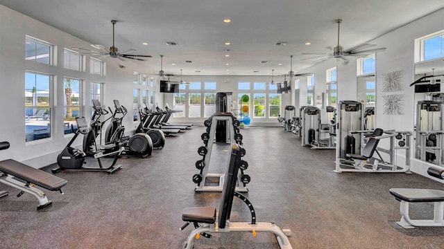 exercise room with ceiling fan