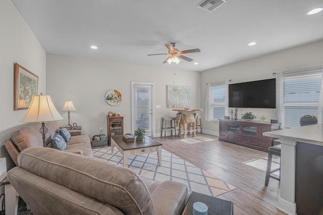 5736 Callaway Cir, Panama City, FL 32404 - living room with ceiling fan and light hardwood / wood-style flooring