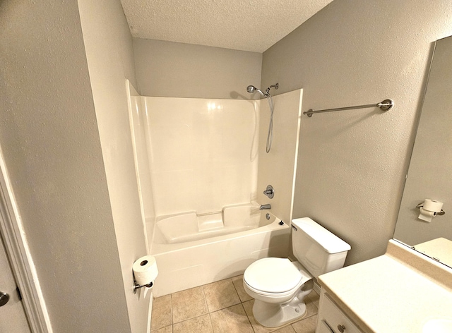 full bathroom featuring a textured ceiling, tile patterned flooring, vanity, toilet, and bathtub / shower combination