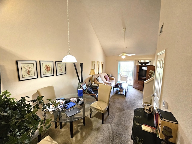 living room with ceiling fan, high vaulted ceiling, and carpet flooring