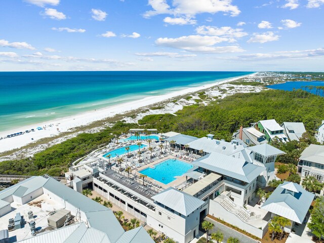 drone / aerial view with a view of the beach and a water view