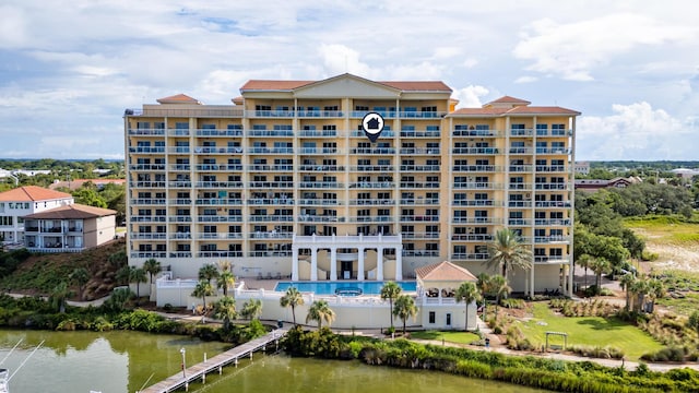 view of building exterior with a water view