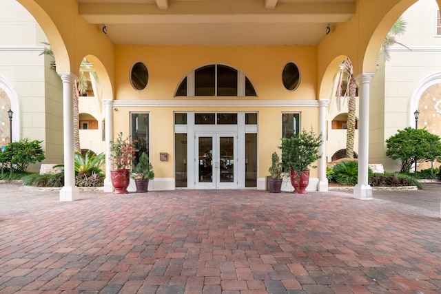 property entrance featuring french doors