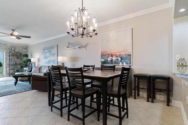 tiled dining room featuring ceiling fan and ornamental molding