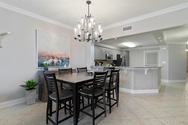 tiled dining area with ornamental molding