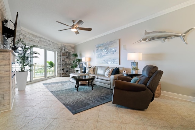 tiled living room with ornamental molding and ceiling fan