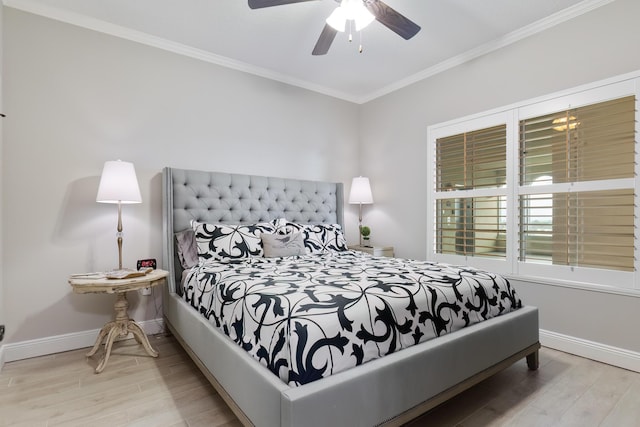 bedroom featuring crown molding, ceiling fan, and light hardwood / wood-style floors